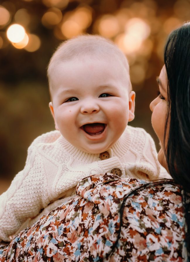 Six month old baby has the biggest smile at his family photo session in Hillsboro Missouri captured by Andrea Moore of Love to the Moon Photography